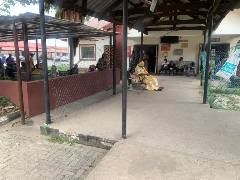 Patients-waiting-to-be-called-to-see-the-doctors-sit-at-the-Chest-Clinic-area-of-the-Alimosho-General-Hospital-Lagos-scaled